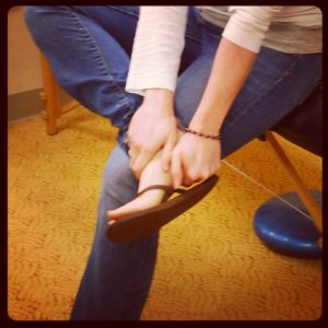 Woman with plantar fasciitis pain